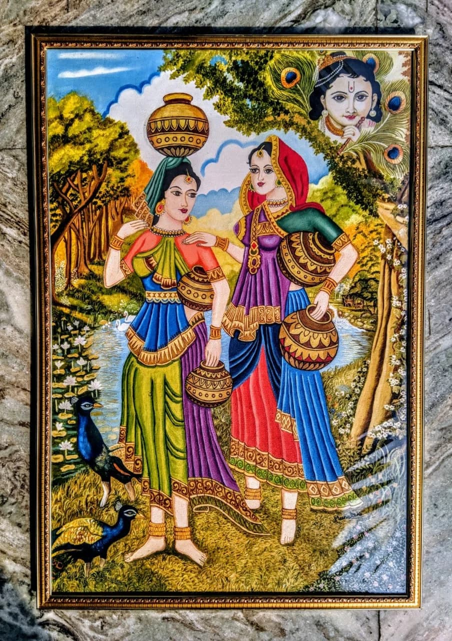Women carrying pots in a rural scene with a small Krishna vignette